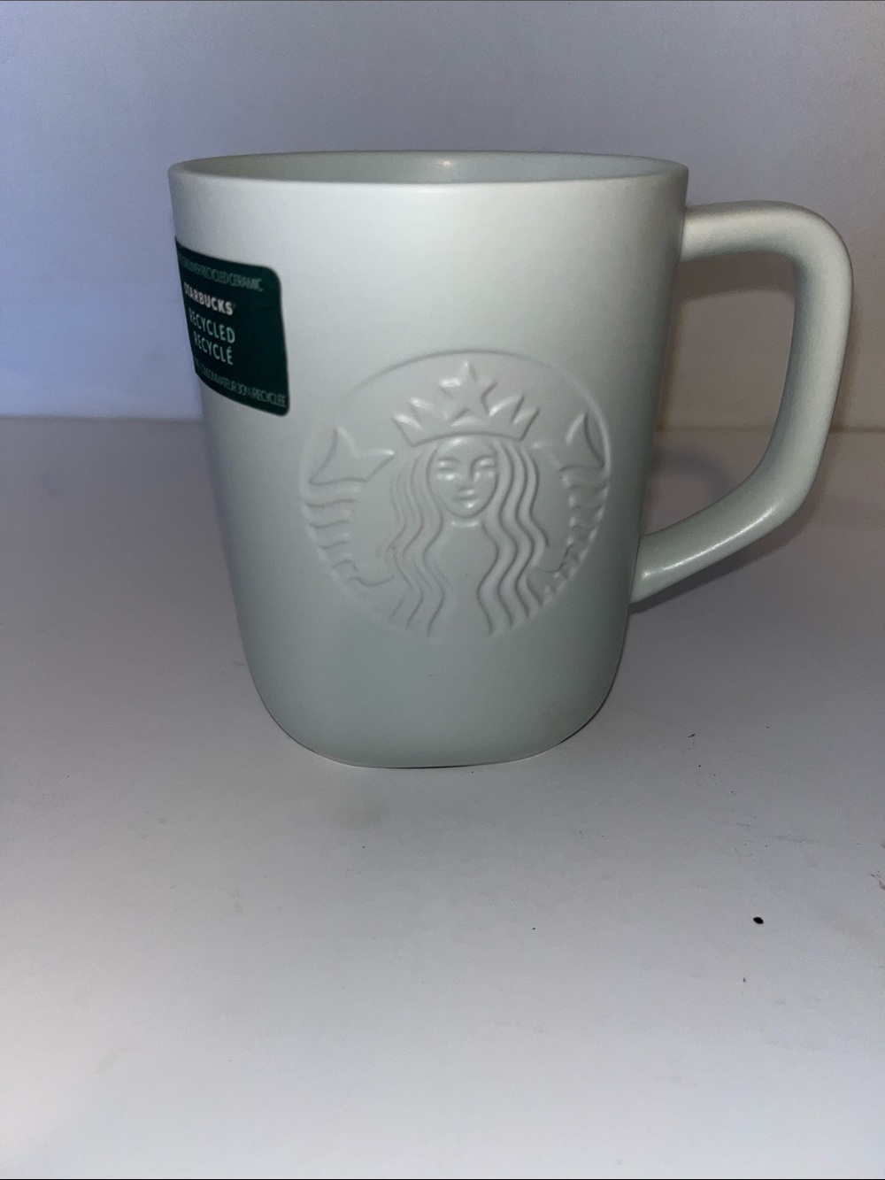 Starbucks White Embossed Logo Ceramic Mug